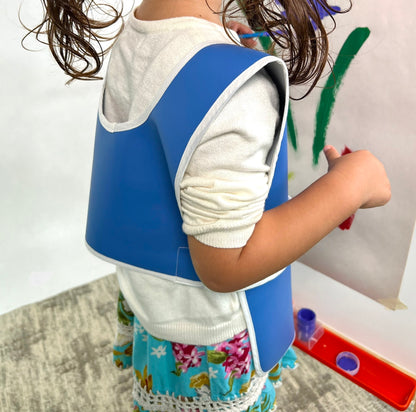 Child's blue durable washable waterproof vinyl rolled Primary Montessori apron